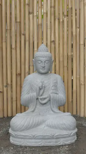 Product image of the product “Seated Buddha made of Riverstone in Dharmachakra gesture of wheel of the teaching of the Dharma, H. 79cm. ”